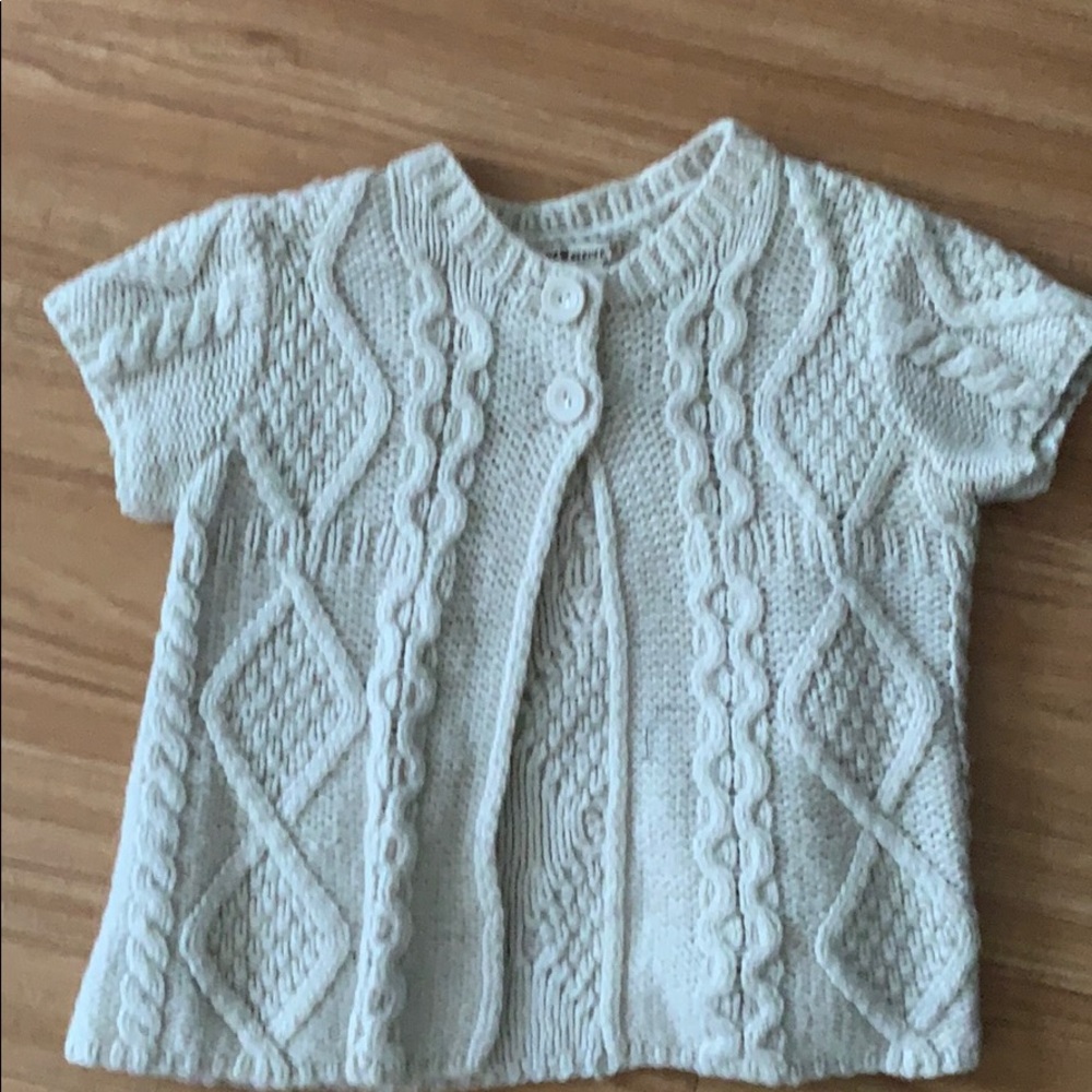 Tan cable knit short sleeve sweater with 2 buttons